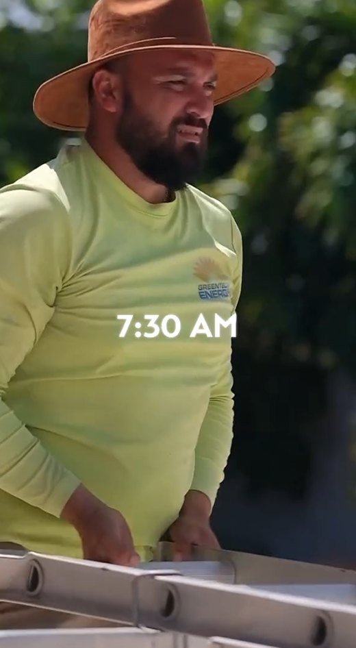 A GreenTech installer starting a rooftop job at 7:30 in the morning